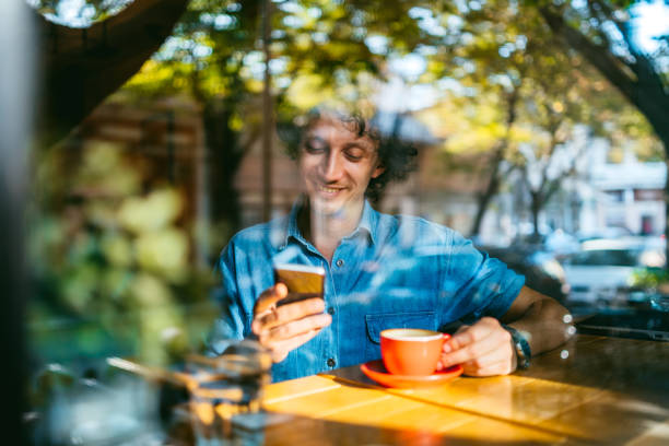 istock Coffee time and mobile phone 1200922369