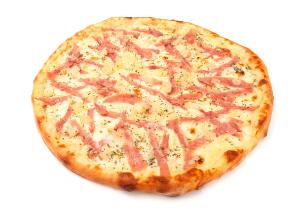 istock Pizza with pineapple, mozzarella and ham. White background. Isolated. Close-up. 1200923076