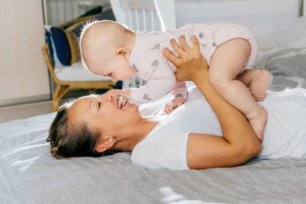 istock Happy young mother with baby. 1200923128