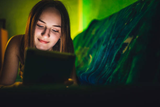 istock Woman watching movie on tablet 1200926291