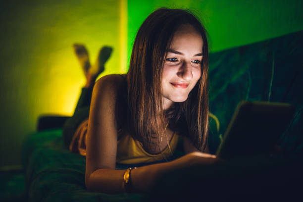 istock Woman watching movie on tablet 1200926306
