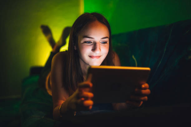 istock Woman watching movie on tablet 1200926319