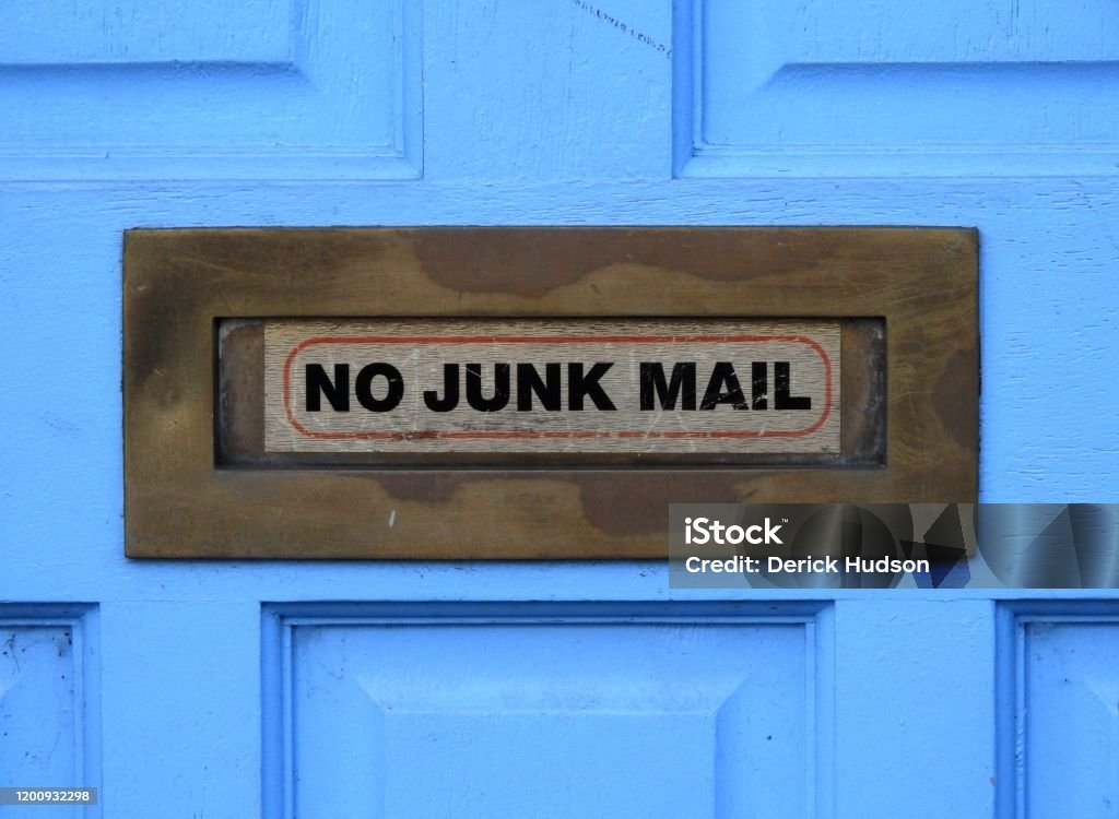 Junk mail 'No Junk Mail' notice on a letterbox. No Junk Mail Stock Photo