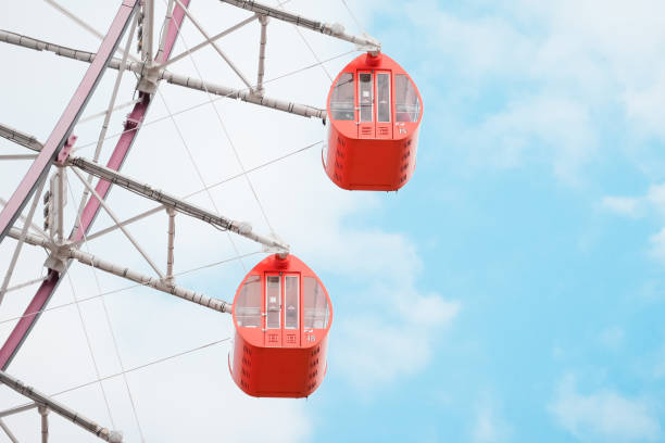 istock Ferris Wheel Over Blue Sky Background 1200932522