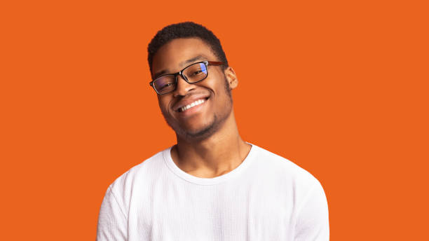 Behandle Milliard Vil ikke African American Guy Smiling At Camera At Studio Stock Photo - Download Image Now - Men, Eyeglasses, People - iStock Behandle Milliard Vil ikke African American Guy Smiling At Camera At Studio Stock Photo - Download Image Now - Men, Eyeglasses, People - iStock