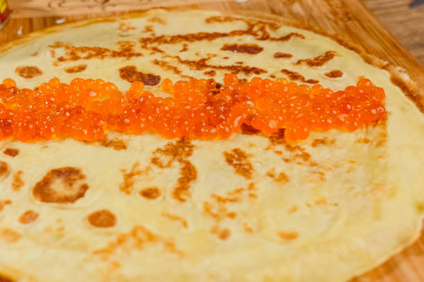 istock Pancakes with red caviar. red caviar 1200934395