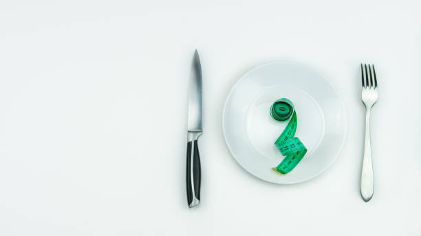 istock Tape measure for better body. 1200936872