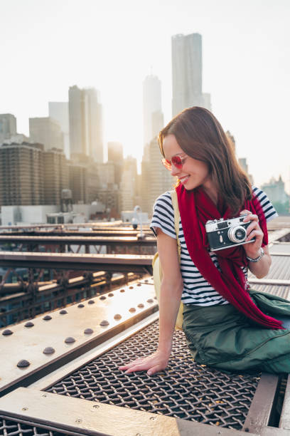 istock Smiling woman on the bridge 1200938952