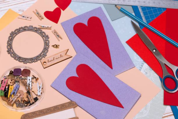 istock scrapbook background. girl holding a postcard on the valentines day