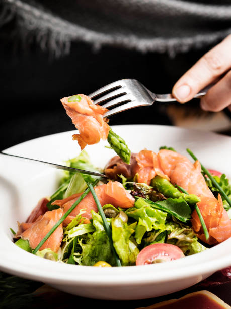 istock Salad,Leaf vegetable salad with smoked salmon and asparagus, 1200941748