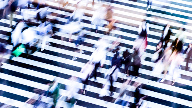 istock People walking at the crosswalk at Tokyo intersection 1200943951
