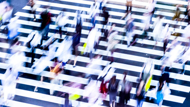 istock People walking at the crosswalk at Tokyo intersection 1200943979