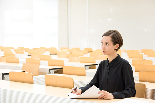 Young woman in class image.