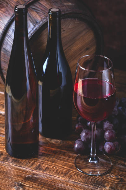 istock Glass of Wine With Grapes 1200947565