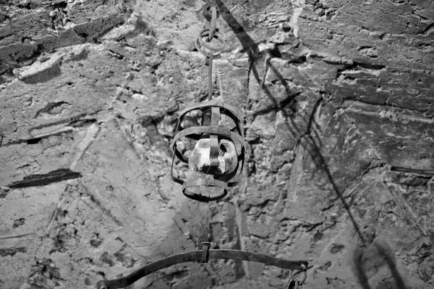A skull in a rusted cage of a medieval torture tower (Prague, Czech Republic, Europe)