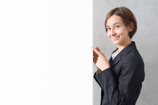 istock Young woman in a suit (copy space) 1200950109