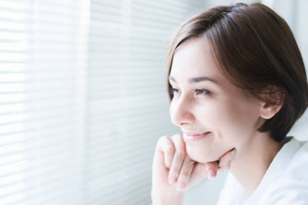 istock Smiling woman with short hair 1200950163