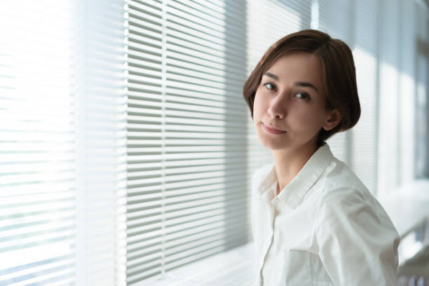 istock Smiling woman with short hair 1200950191