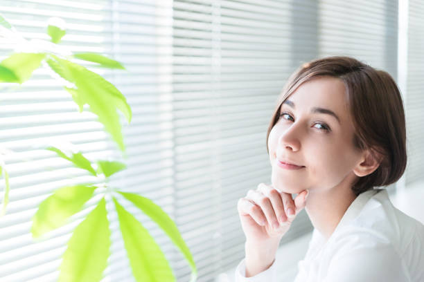 istock Smiling woman with short hair 1200950220
