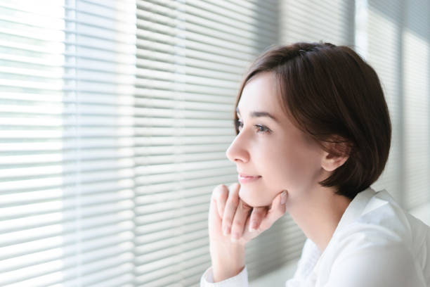istock Smiling woman with short hair 1200950231