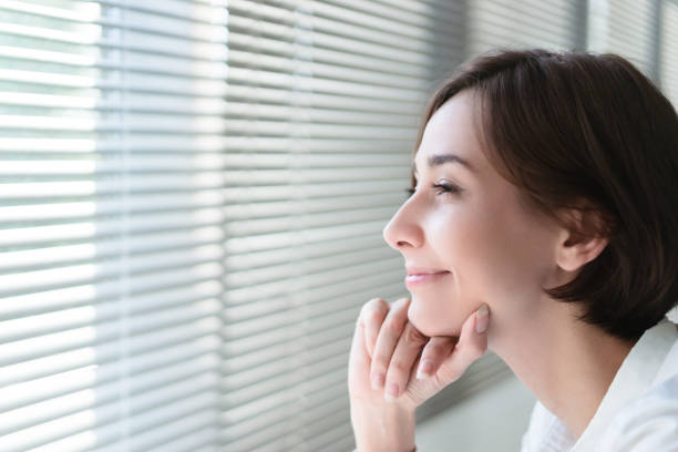 istock Smiling woman with short hair 1200950244