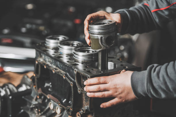engine piston repair stock photo