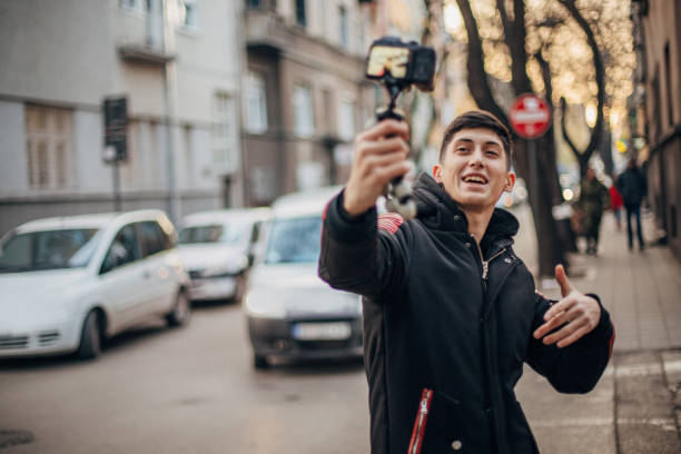 istock Cheerful teenager is vlogging 1200951615