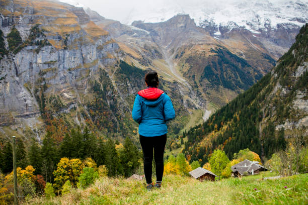 istock young woman hiking on mountain 1200953576