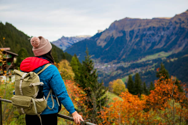 istock young woman hiking on mountain 1200953736