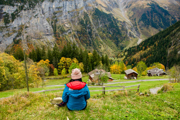 young woman hiking  and take a rest in murren, Swiss