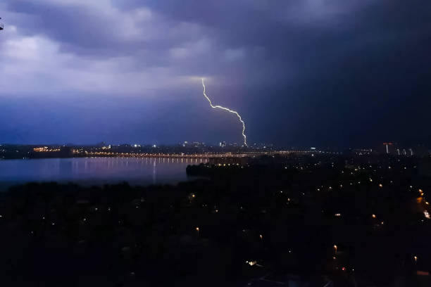 istock Lightning during thunderstorm in the sky. Natural phenomenon of 1200955990
