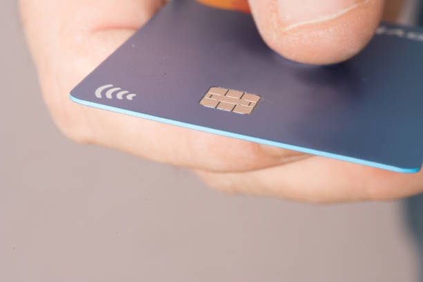 istock A man and a credit card 1200957277