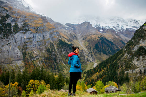 istock young woman hiking on mountain 1200957555
