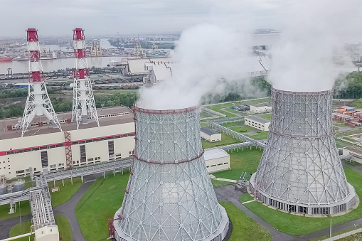 Soaring steam towers of a nuclear power plant.