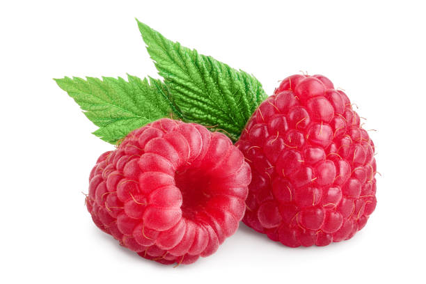 istock Ripe raspberries with leaf isolated on a white background 1200961483