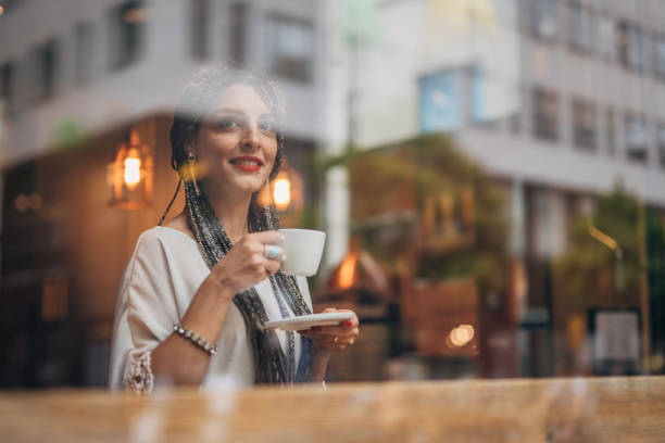 istock Lady sitting on coffee break in cafe downtown 1200961940