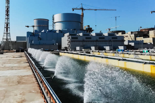 the cooling water system of a nuclear power plant. - torre de arrefecimento imagens e fotografias de stock