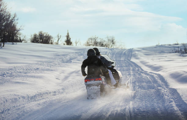 istock Driving snowmobile in Colorado, USA 1200965276