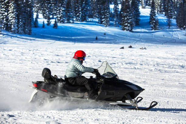 istock Driving snowmobile in Colorado, USA 1200966081