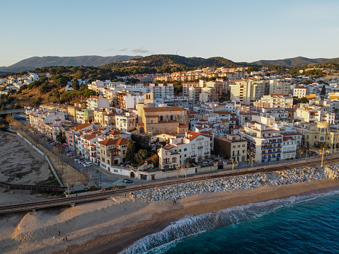 Vista aérea del pueblo de Sant Pol de Mar y su iglesia Ermita de Sant Jaume. Situado en la costa del Maresme, Cataluña. photo