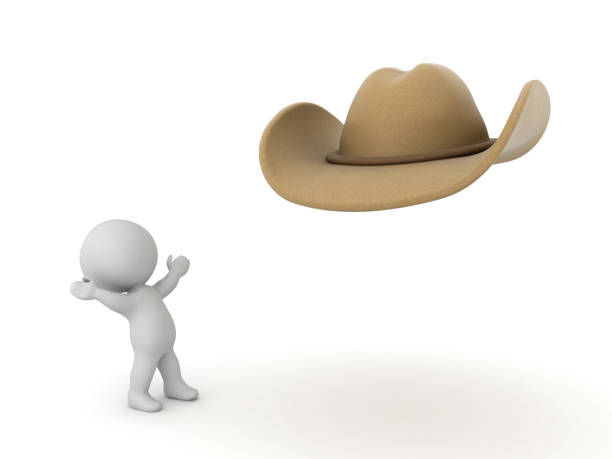 Studio shot of masked little kowboy with revolver toy.