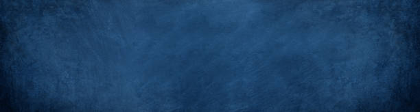 istock wide horizontal dark blue cement and overlay on chalkboard background 1200968839