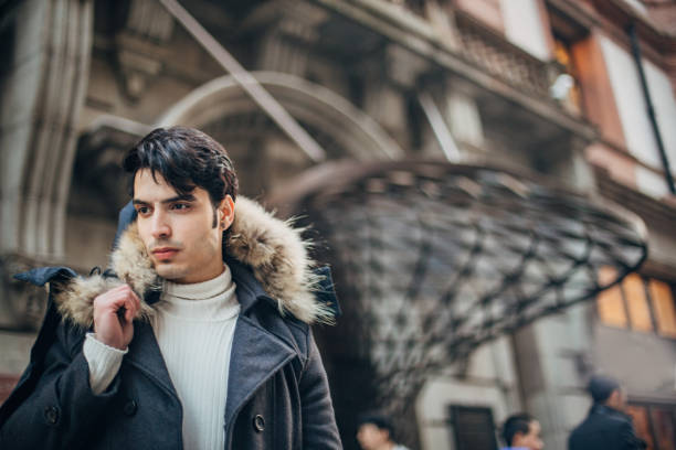 istock Handsome guy walking on the street 1200969884