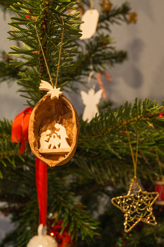 wooden christmas tree ornament nativity scene in a nutshell