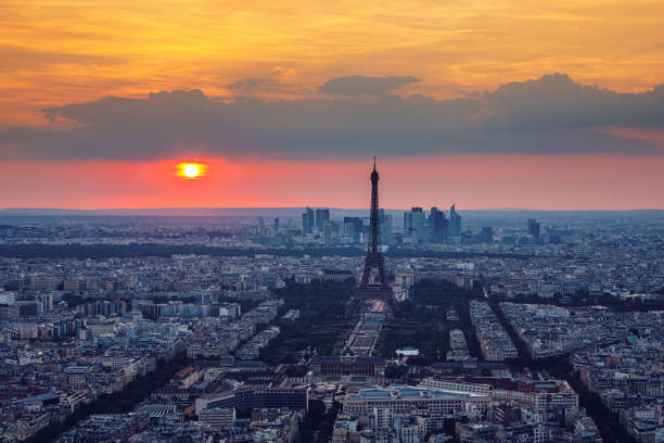istock View of Paris with Eiffel Tower from Montparnasse building. Eiffel tower view from Montparnasse at sunset, view of the Eiffel Tower and La Defense district in Paris, France. 1200972207