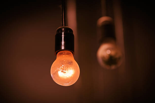 istock A bulb without a lampshade hanging on a wire 1200972378