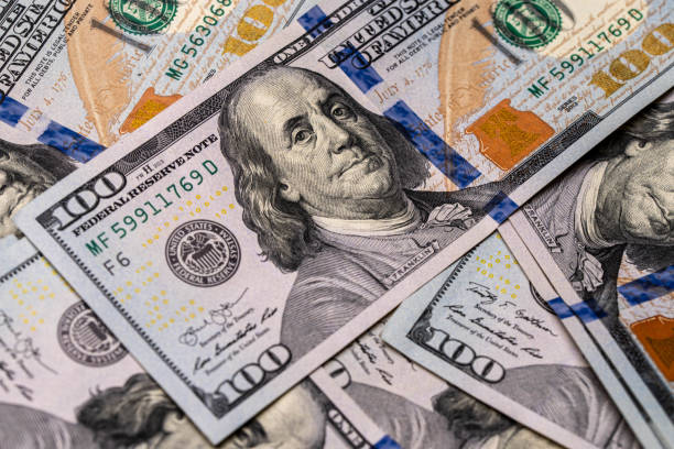 istock 100 Dollar Money Finance Background 1200973425