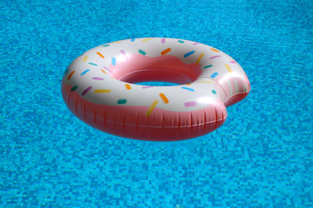 istock A donut-shaped inflatable ring floats in the pool 1200973513