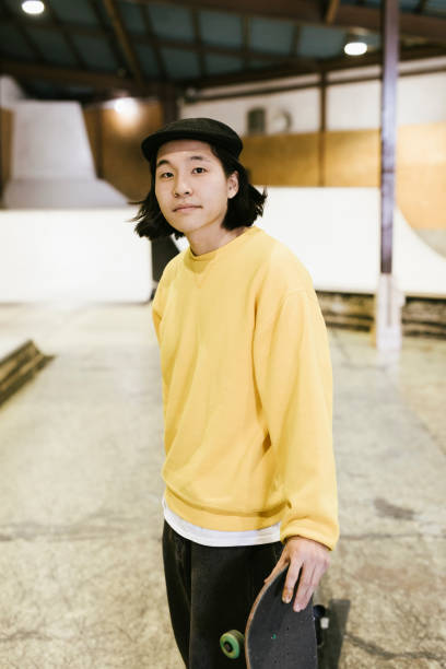 istock Portrait of Asian Skateboarder 1200975308