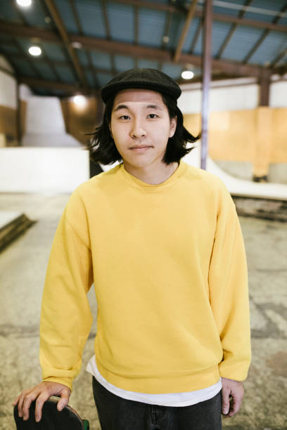 istock Portrait of Asian Skateboarder 1200975385